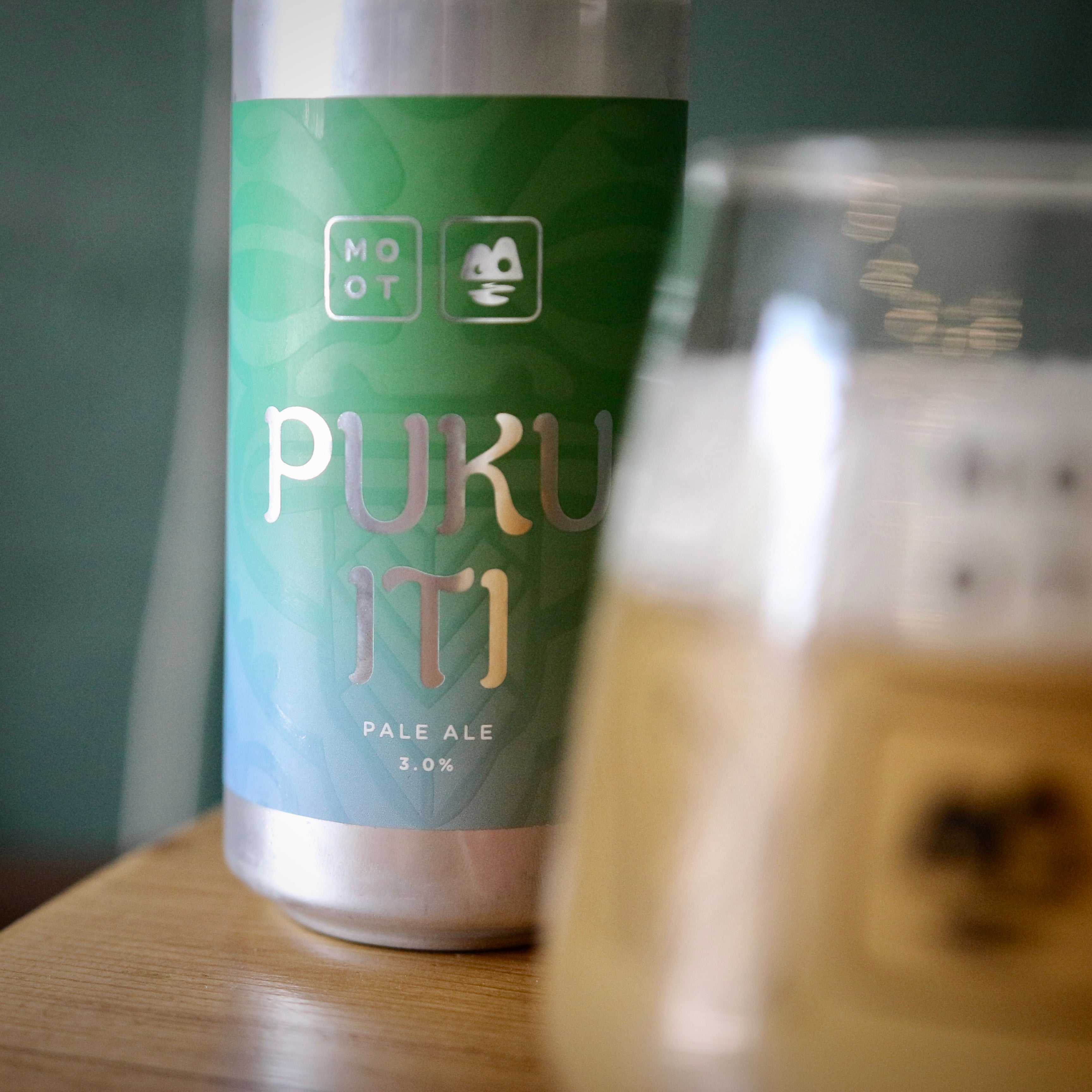 Puku Iti beer label close-up featuring bold minimal design and hazy pale ale text