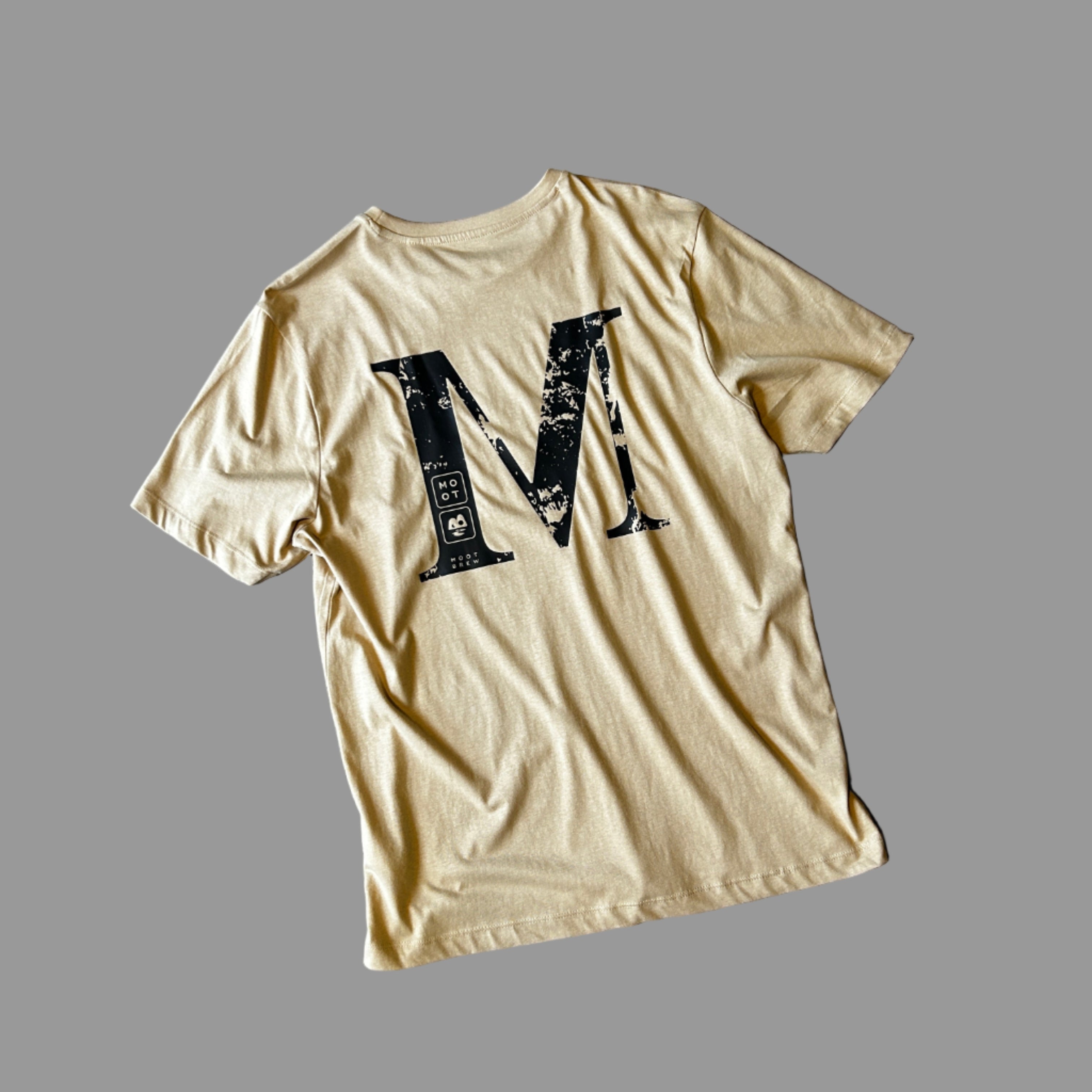 BACKWARDS M TEE