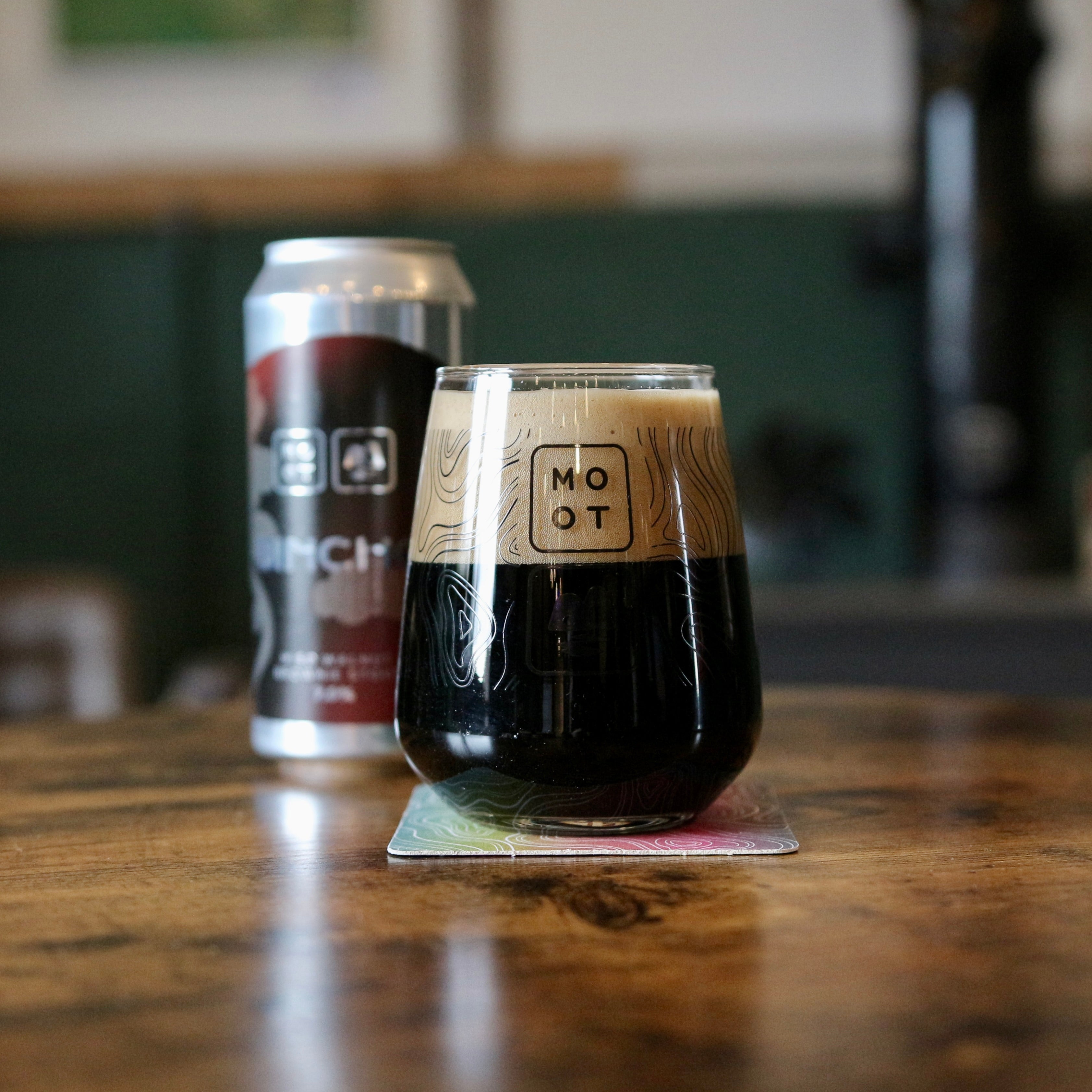 Thick pour of BINCHO stout with dark foam and glossy chocolate tones