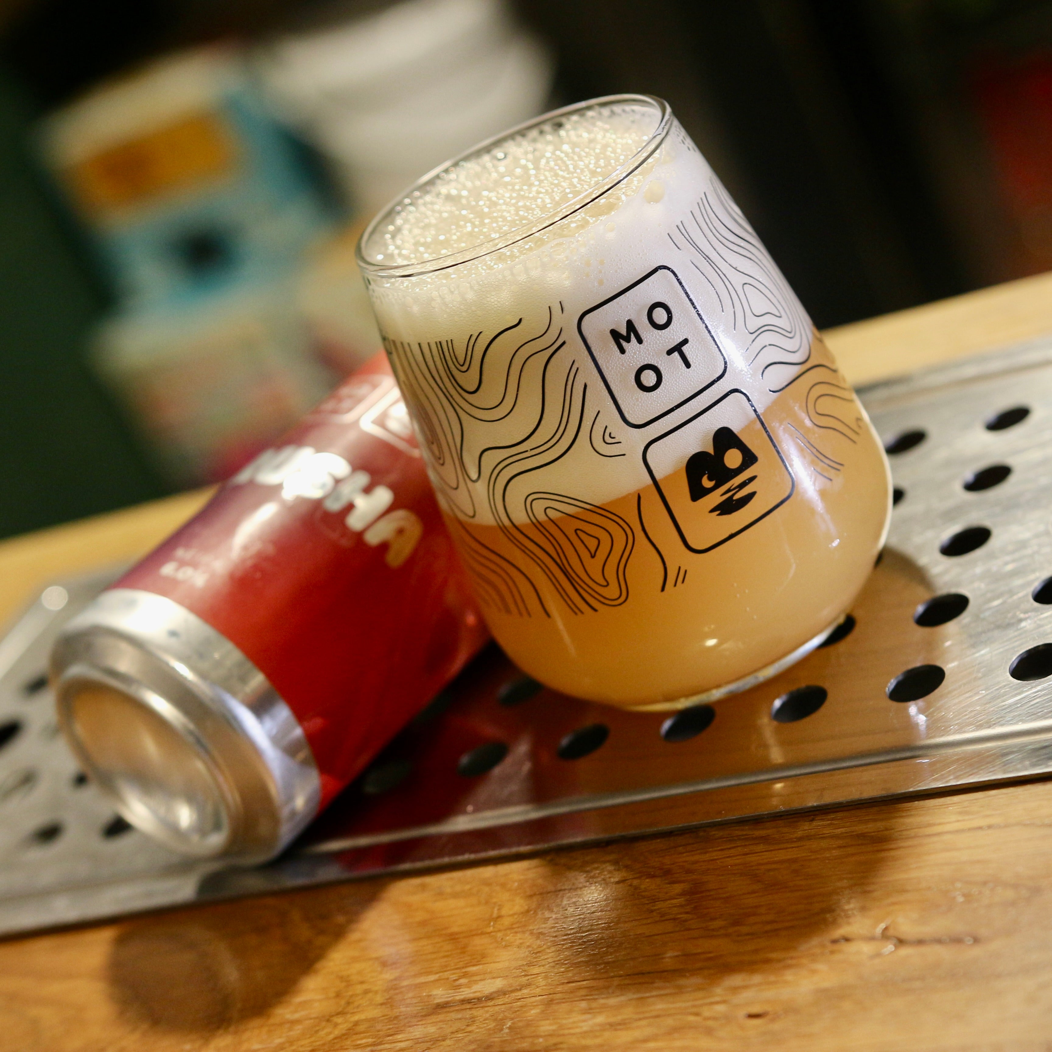 Hazy golden pour of Krusha NEIPA in glass showing thick body and foam
