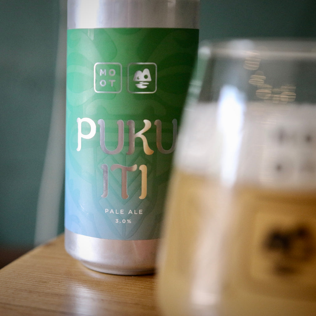 Puku Iti beer label close-up featuring bold minimal design and hazy pale ale text